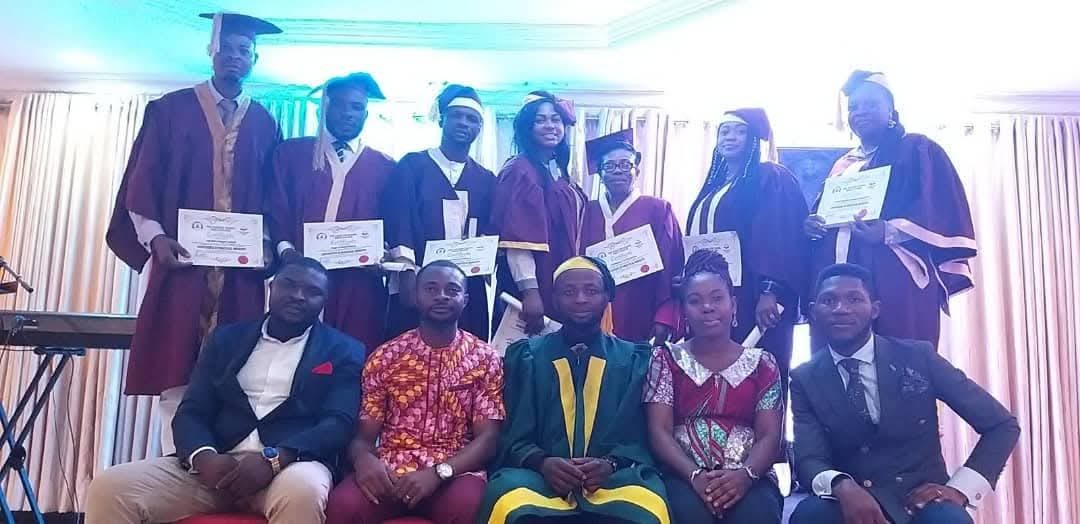 Bible School graduates with their certificates at a graduation ceremony