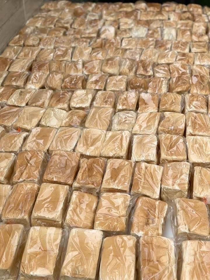 Loaves of bread wrapped and set out for distribution