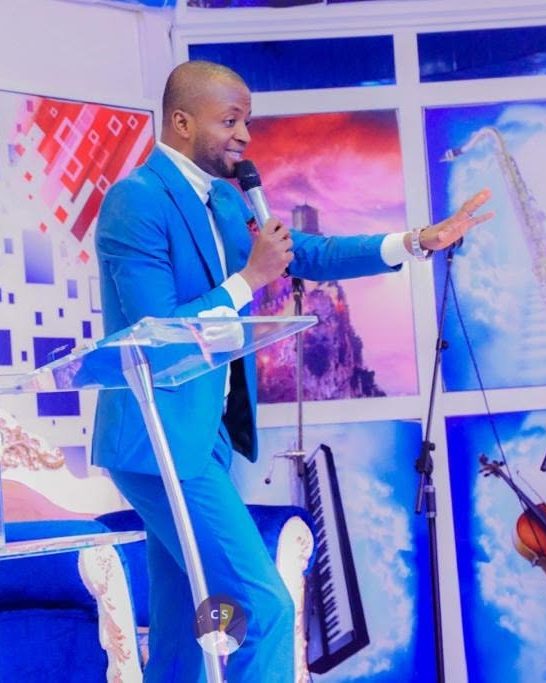 Pastor Ifeanyi Anierobi preaching at the pulpit